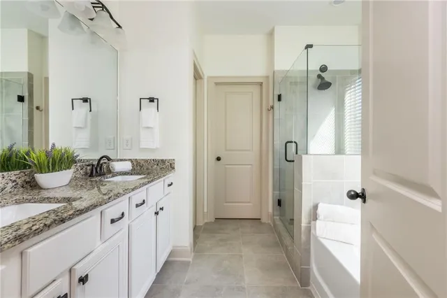 a bathroom with sink and mirror
