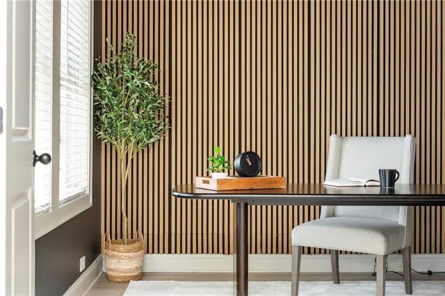 a view of a balcony with a floor to ceiling window