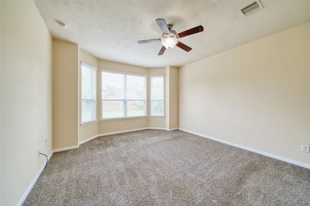 a bathroom with a sink double vanity and a mirror
