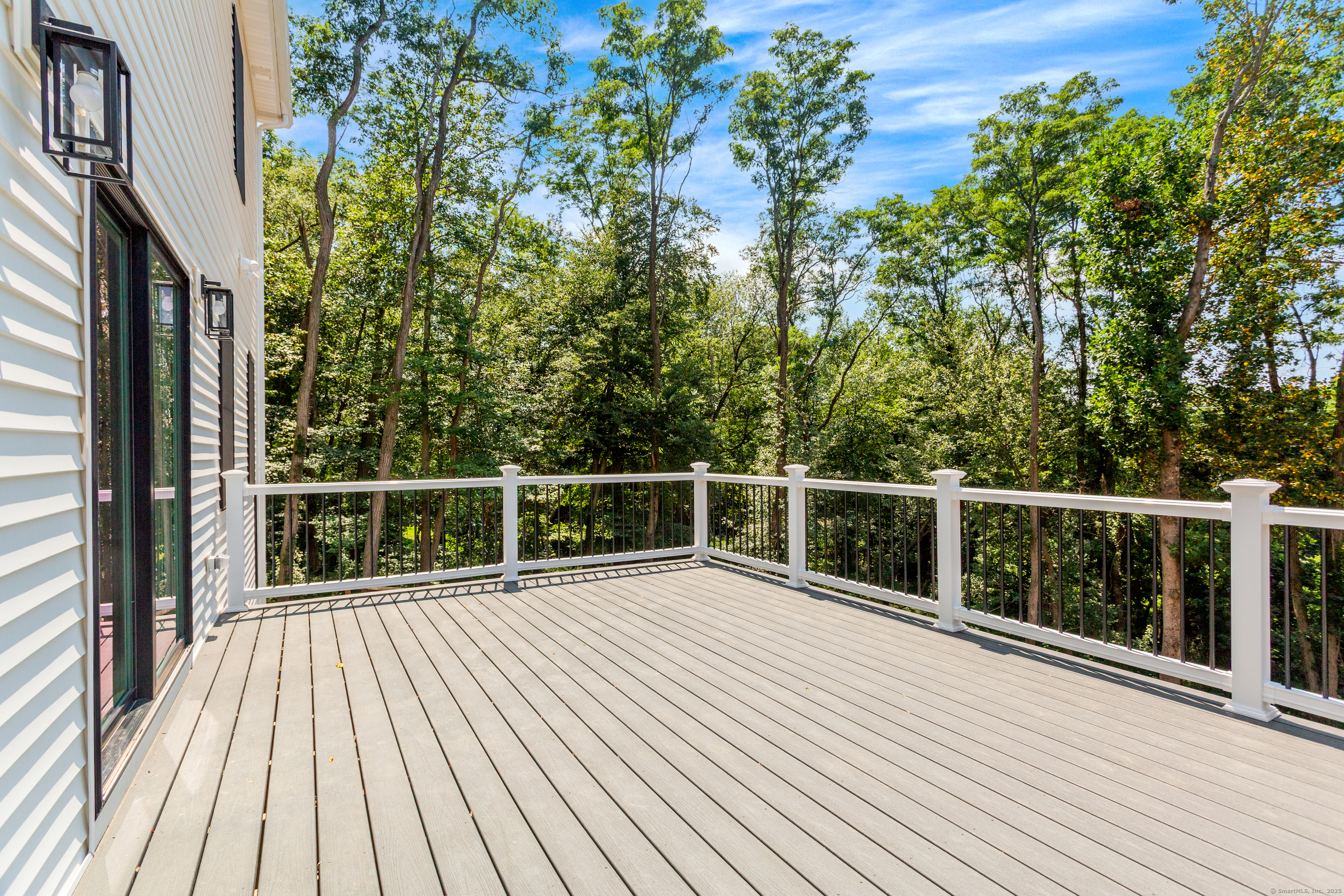 815 James Farm Road Stratford, CT 06614 - Photo 14 of 34 a view of balcony with wooden floor and fence