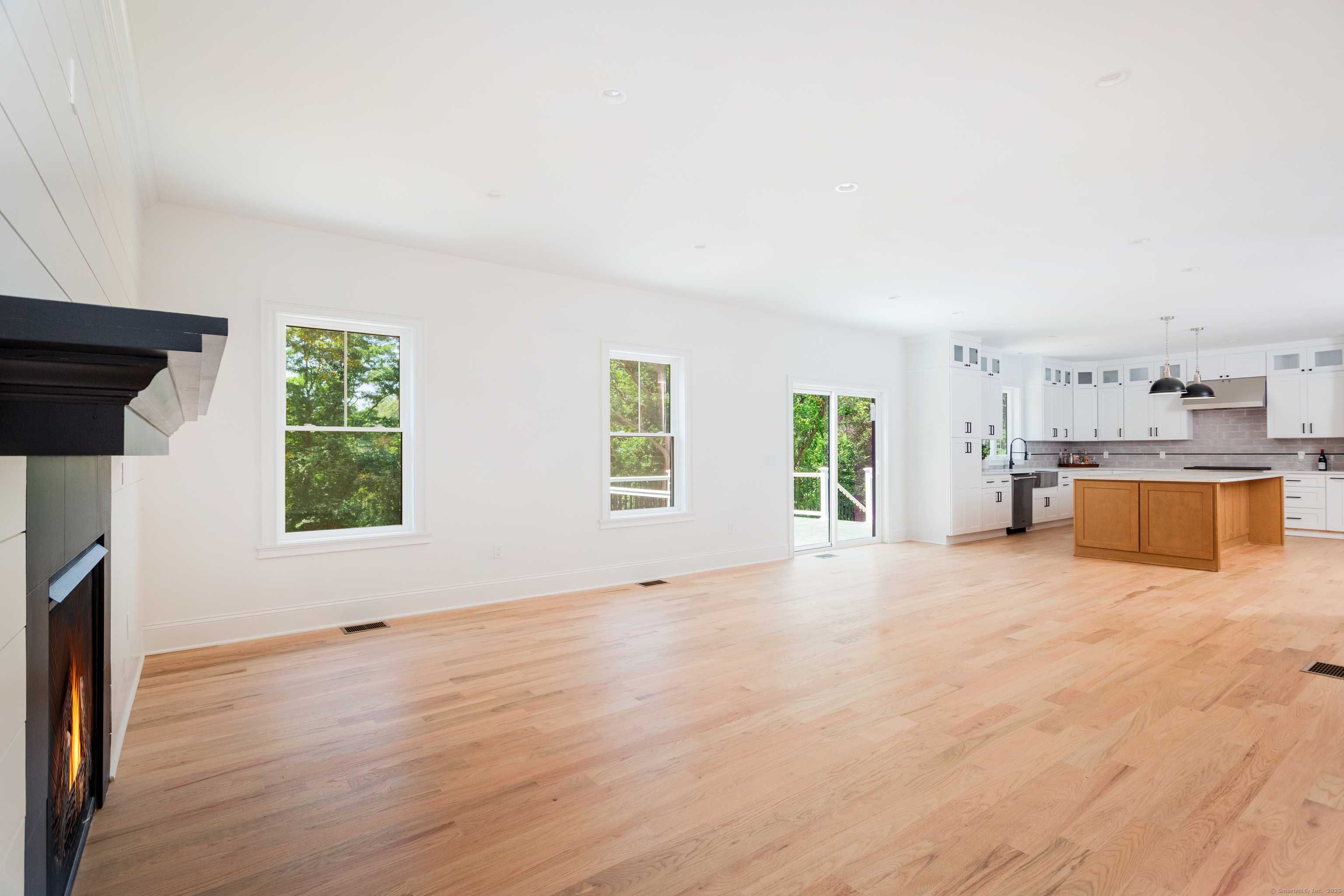 815 James Farm Road Stratford, CT 06614 - Photo 15 of 34 a view of empty room with wooden floor and window