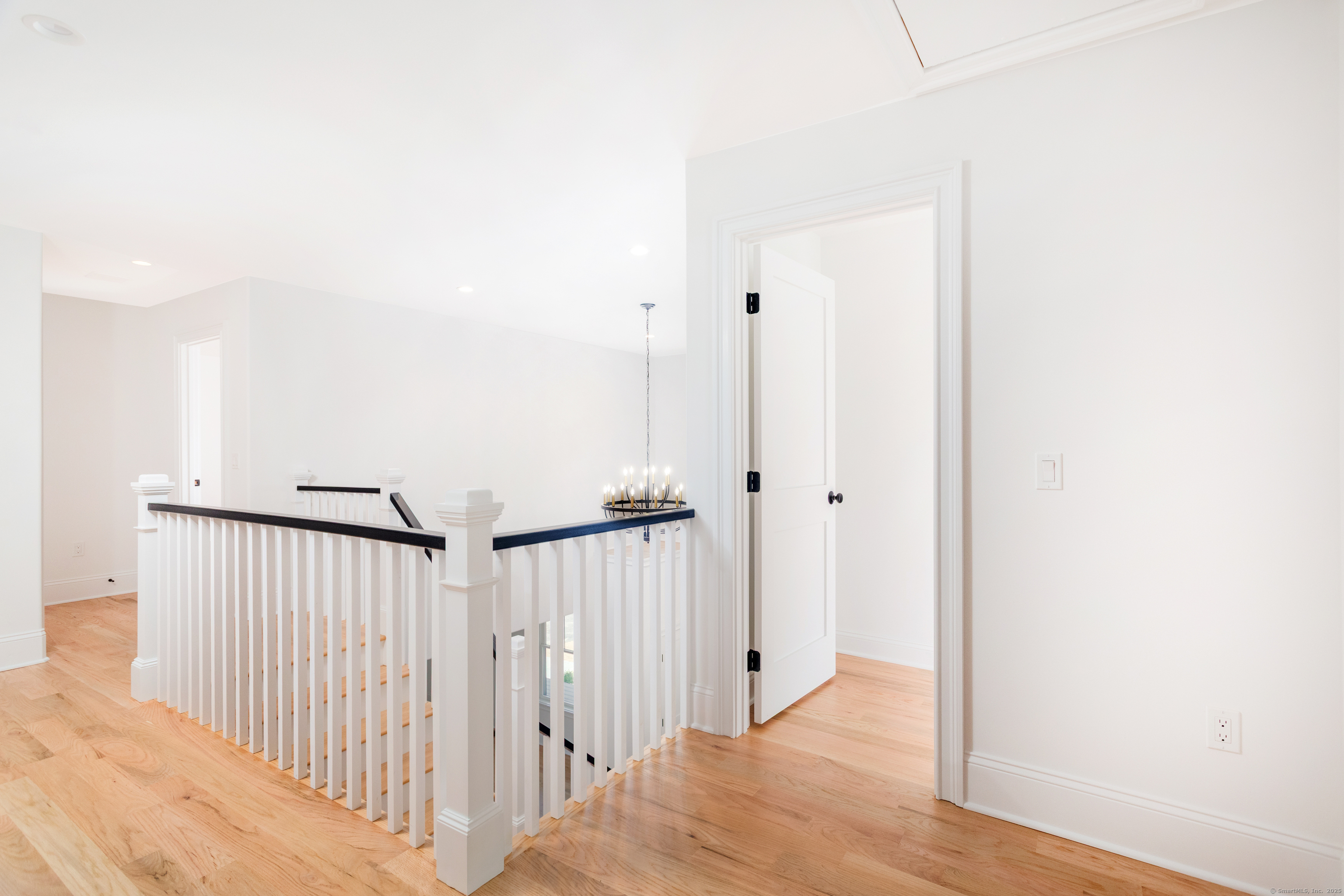 815 James Farm Road Stratford, CT 06614 - Photo 21 of 34 a view of a hallway with wooden floor and entryway