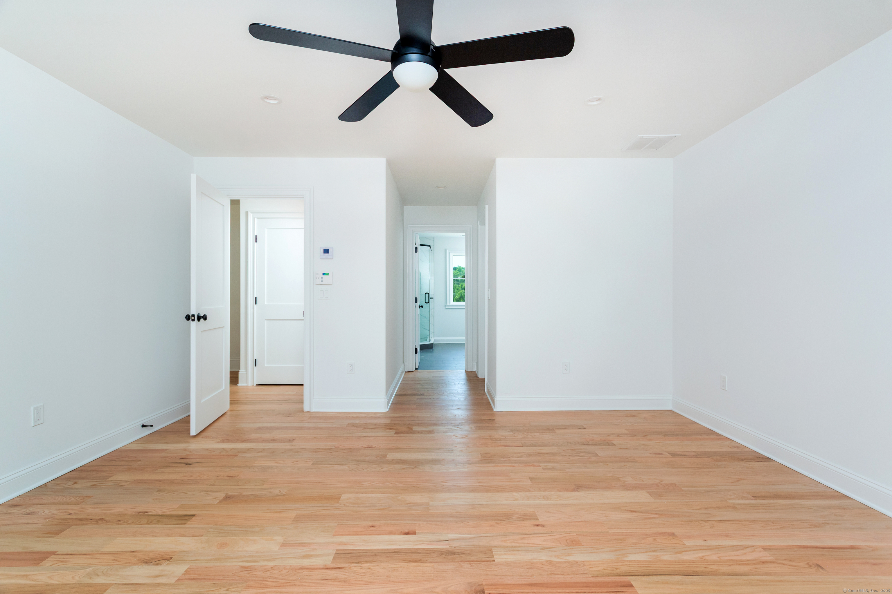 815 James Farm Road Stratford, CT 06614 - Photo 24 of 34 a view of an empty room and wooden floor