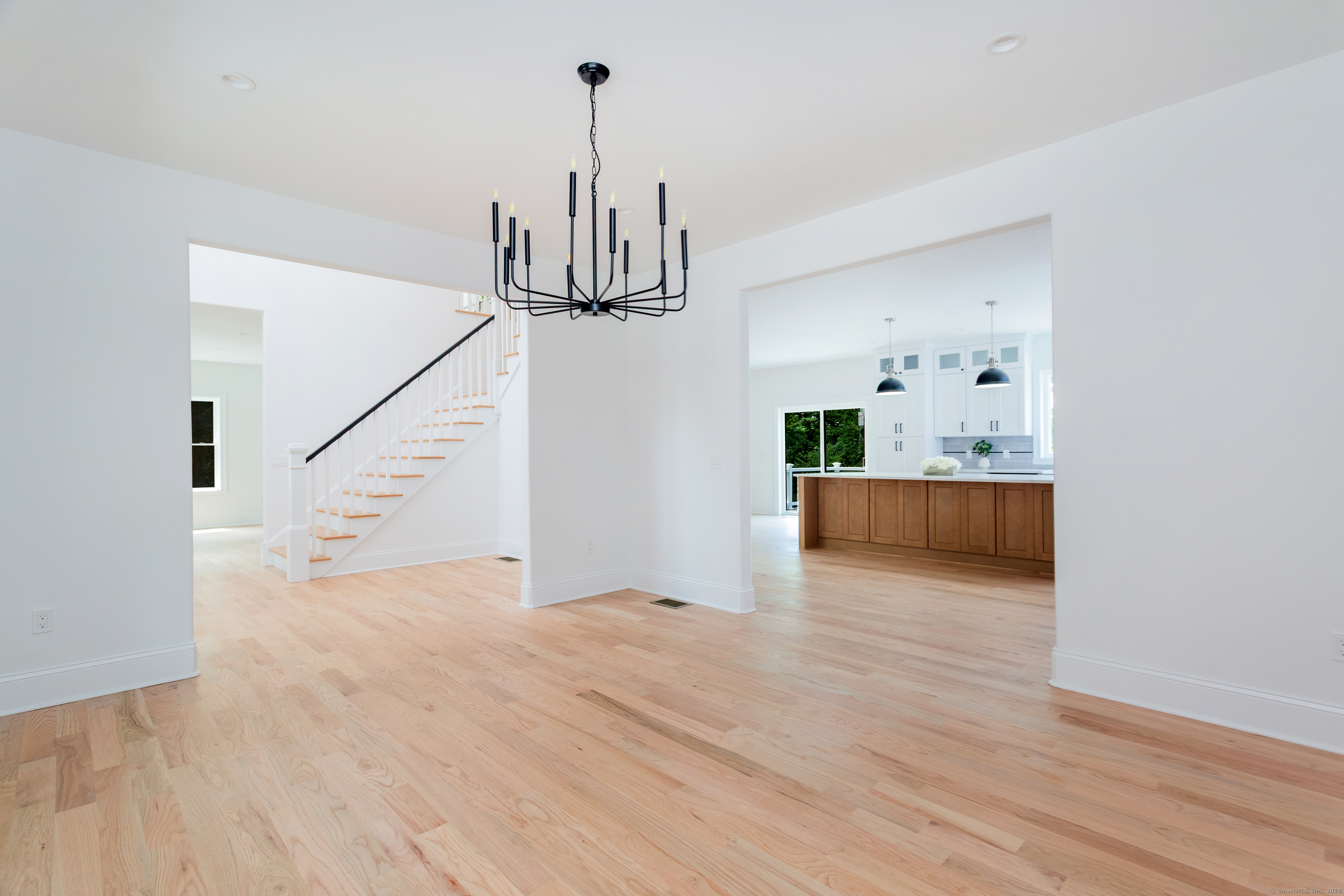 815 James Farm Road Stratford, CT 06614 - Photo 5 of 34 a view of empty room with wooden floor