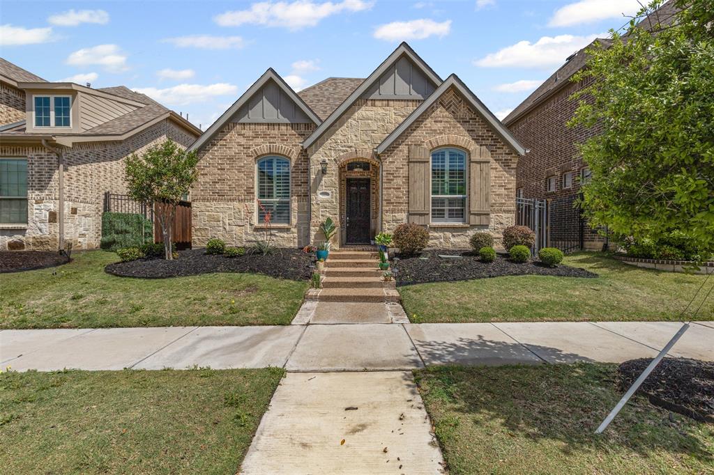 1411 Birds Fort Trail Arlington, TX 76005 - Photo 1 of 1 a front view of a house with a yard and potted plants