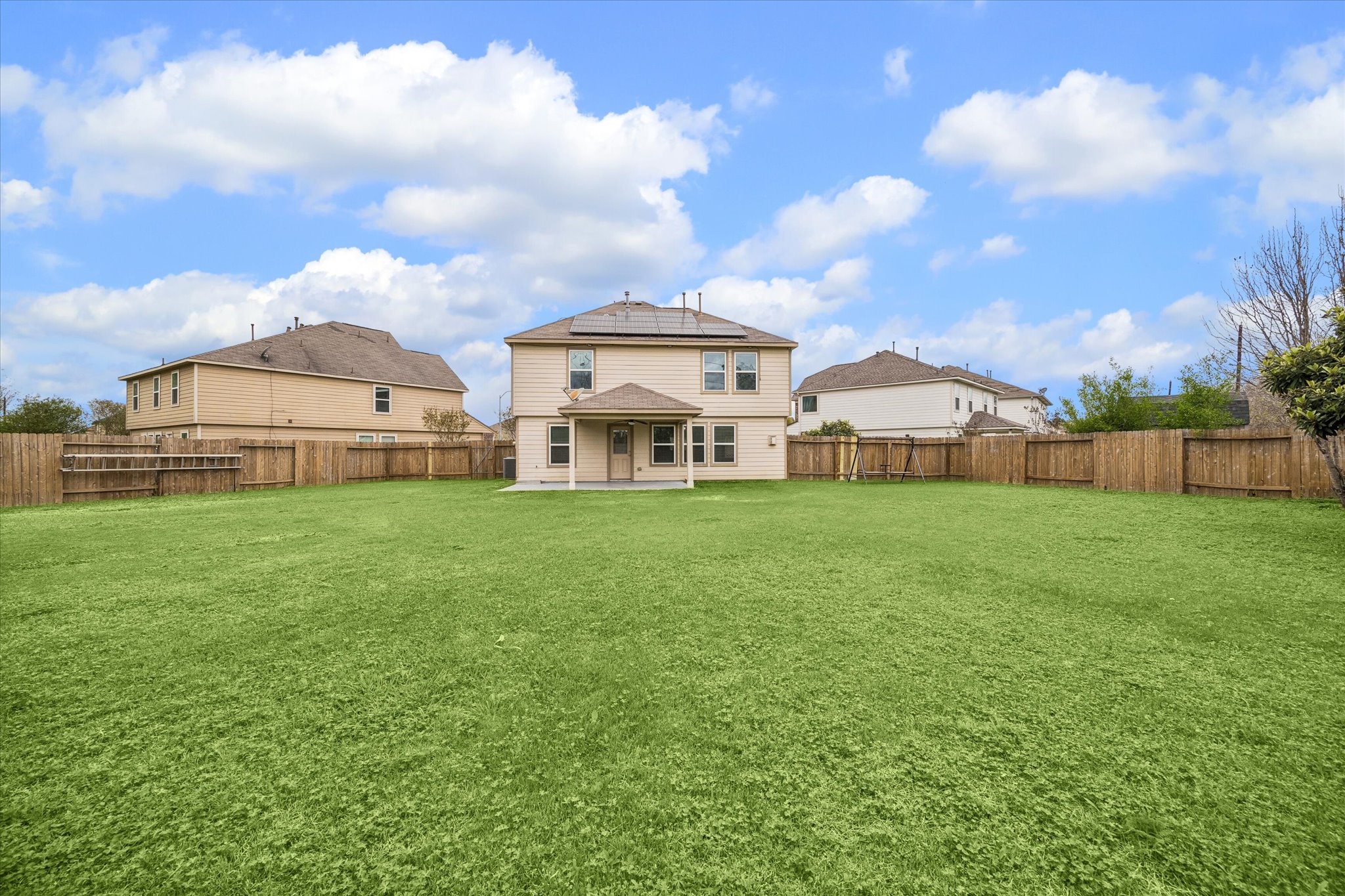 15642 South Fall Fern Circle Houston, TX 77044 - Photo 8 of 32 a view of a house with a big yard and large trees