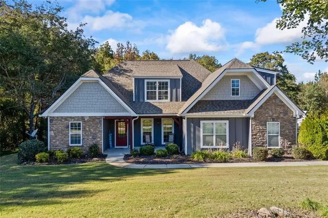 front view of a house with a yard