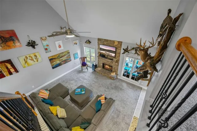 a view of living room with furniture and a flat screen tv