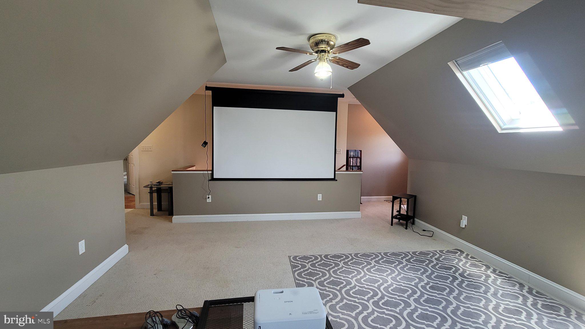 257 Church Point Lane Colonial Beach, VA 22443 - Photo 20 of 25 Versatile attic space with projector screen.