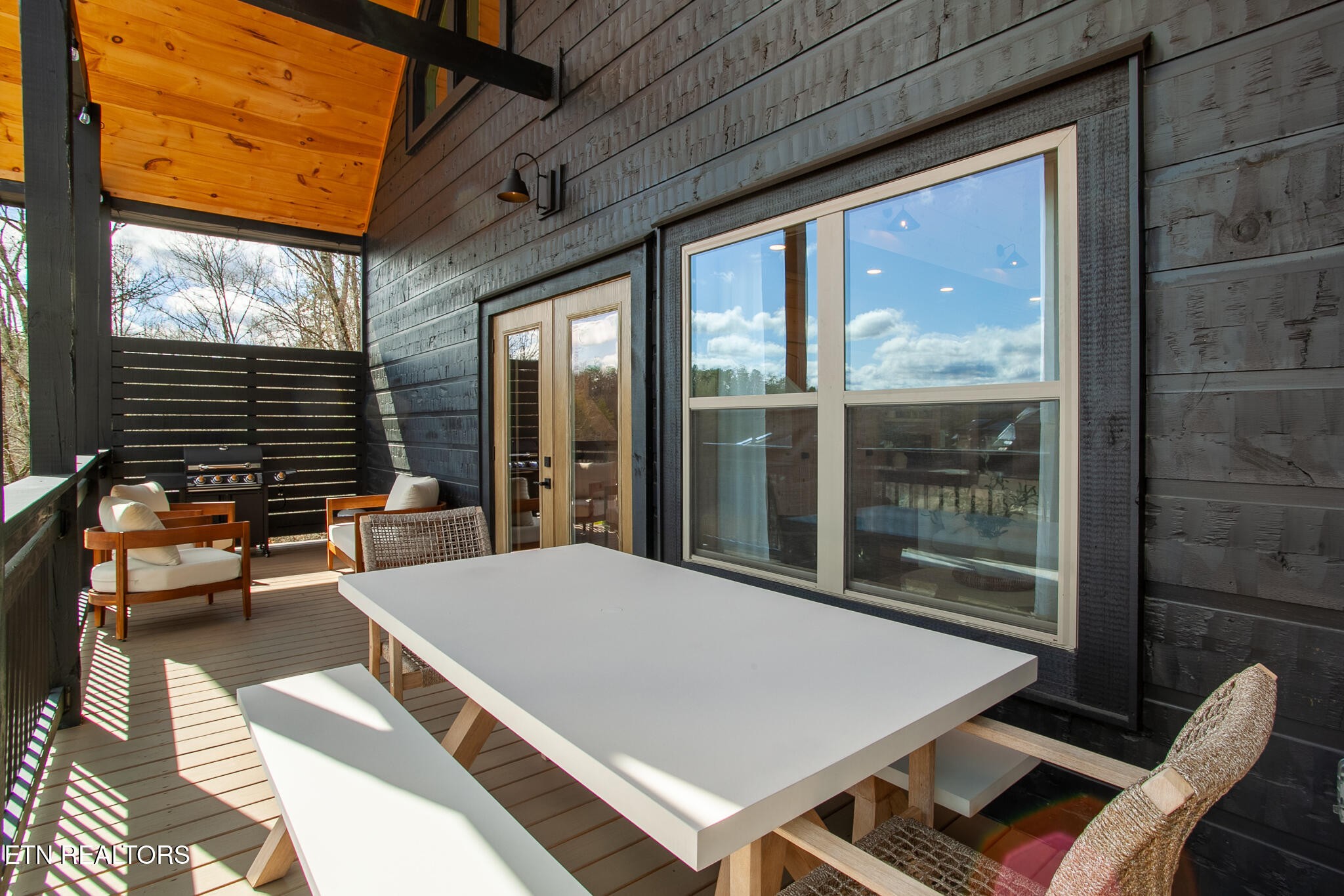 2828 Sequoia Road Sevierville, TN 37863 - Photo 54 of 58 a balcony with furniture and a large window