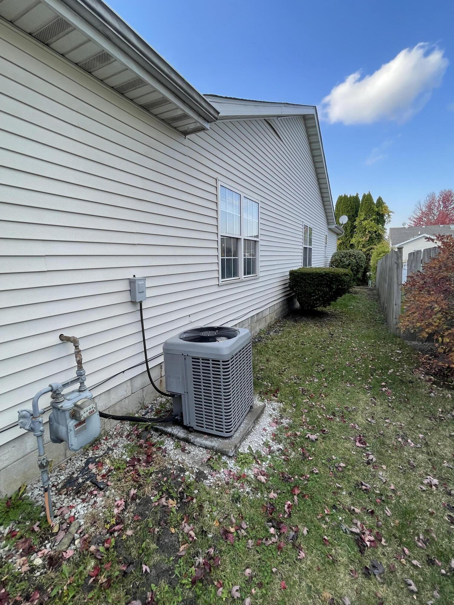 1738 Beech Drive Crown Point, IN 46307 - Photo 15 of 16 a view of a backyard with plants and large tree