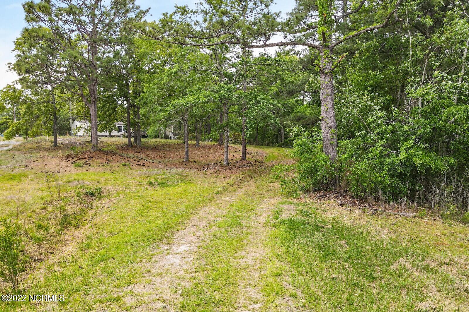 174 Dixon Road Holly Ridge, NC 28445 - Photo 1 of 26 01_zfsdff14_mls