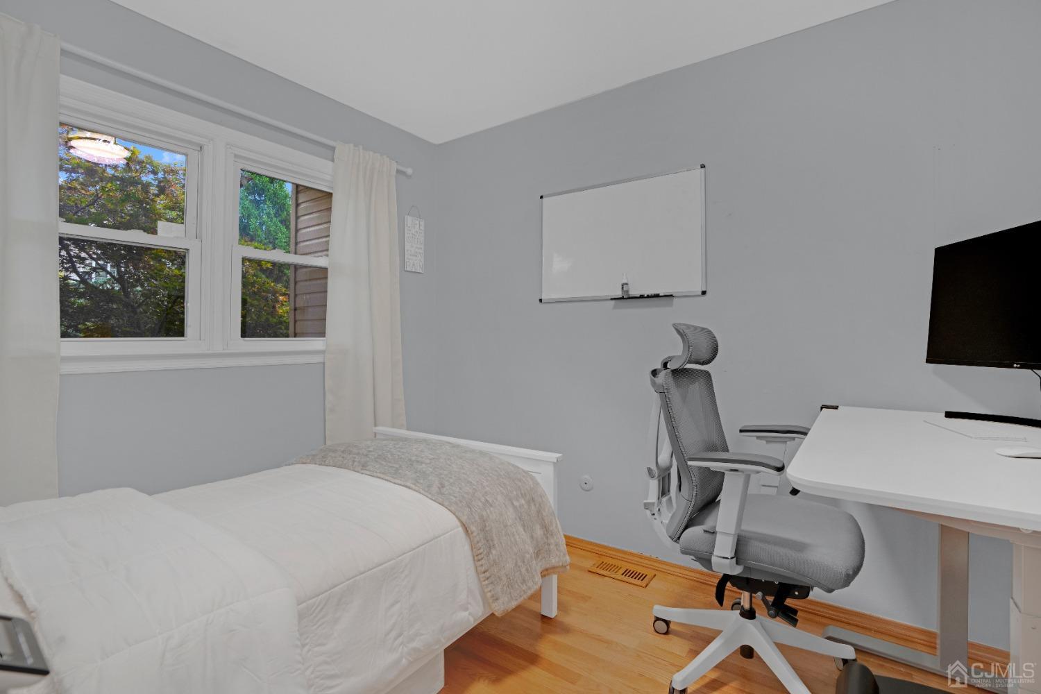 41 Laura Avenue Edison, NJ 08820 - Photo 31 of 45 a bedroom with a workspace