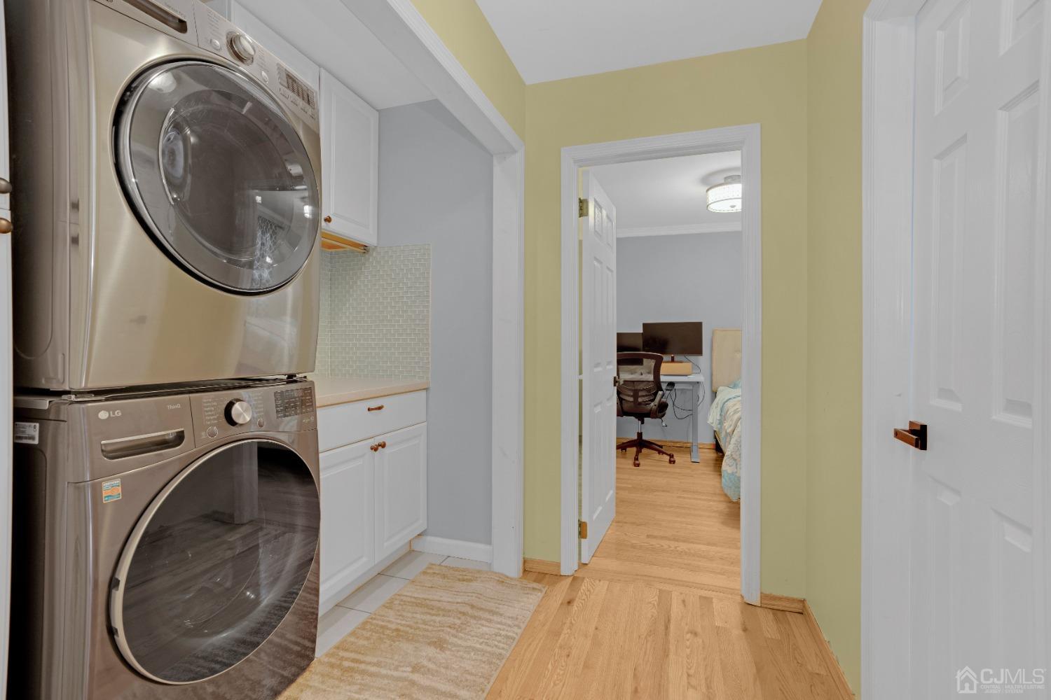 41 Laura Avenue Edison, NJ 08820 - Photo 33 of 45 a view of a hallway with washer and dryer