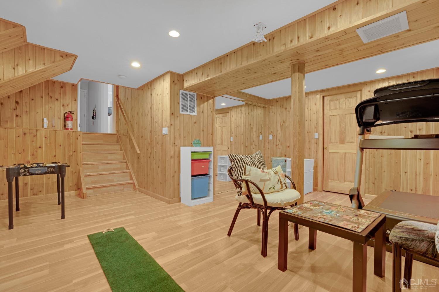 41 Laura Avenue Edison, NJ 08820 - Photo 34 of 45 a dining room with furniture and a wooden floor