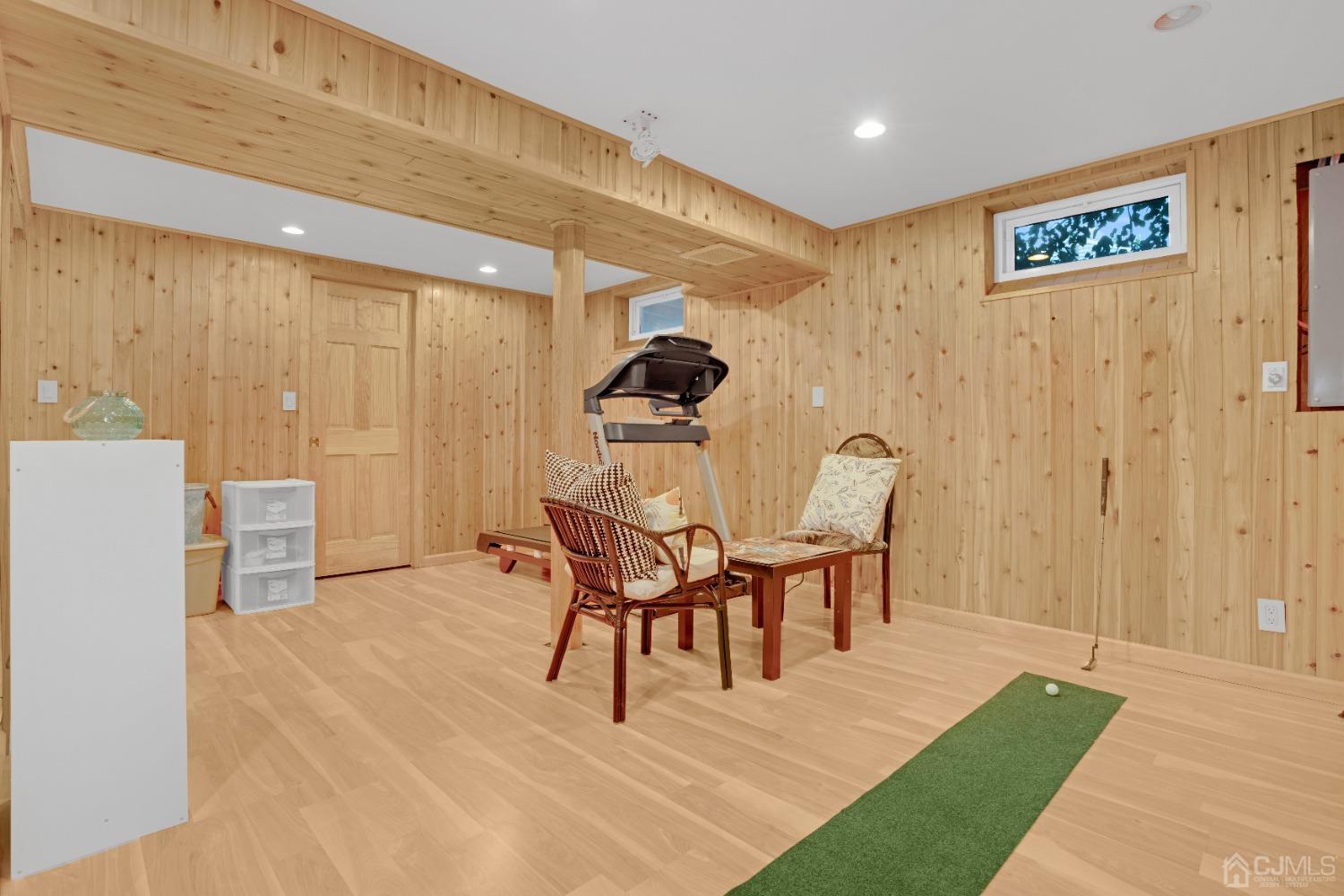 41 Laura Avenue Edison, NJ 08820 - Photo 35 of 45 a dining room with furniture and wooden floor