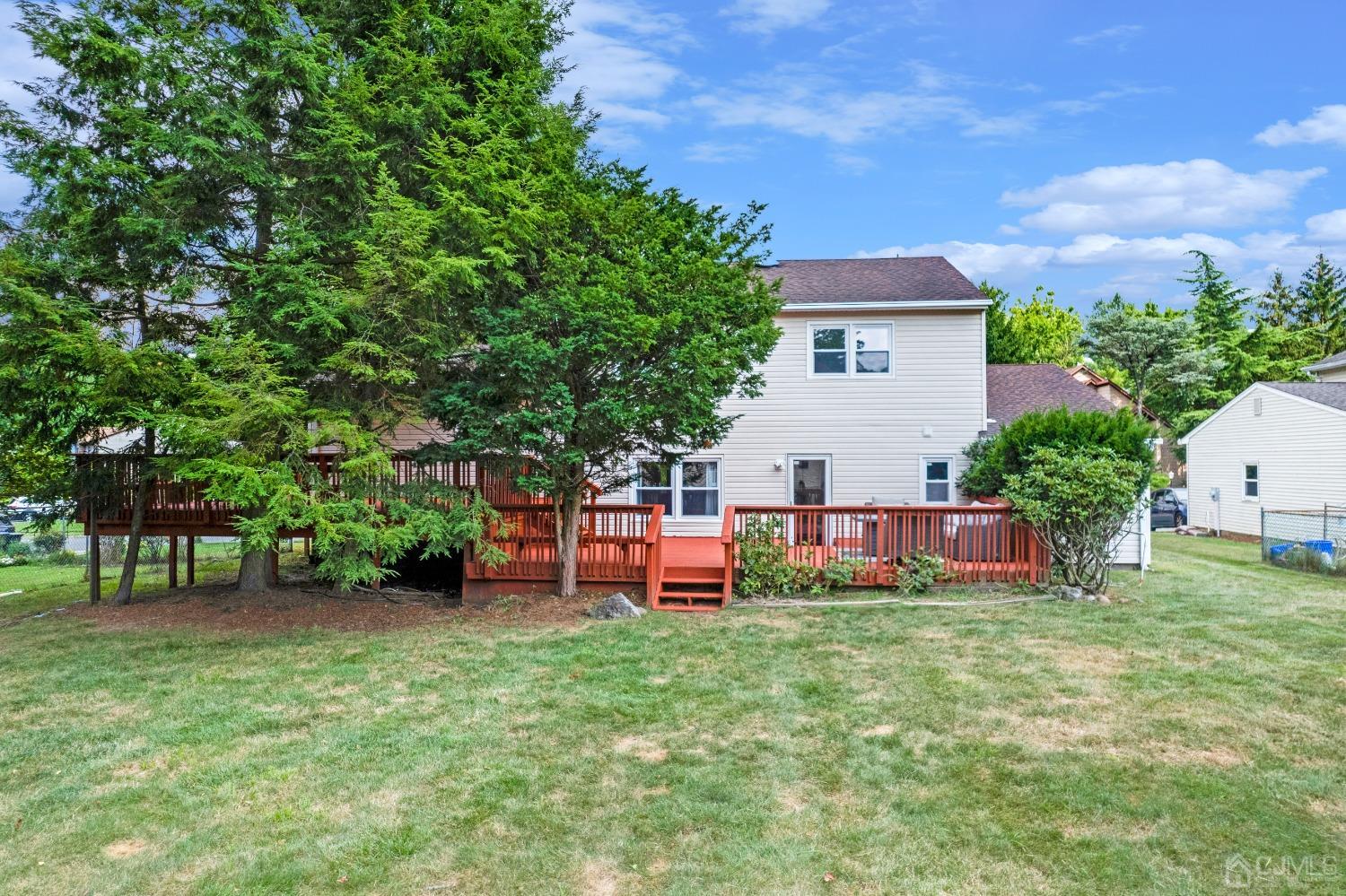 41 Laura Avenue Edison, NJ 08820 - Photo 42 of 45 front view of a house with a big yard