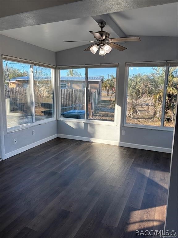 405 Copperfield Road Spring Hill, FL 34606 - Photo 10 of 25 an empty room with wooden floor and windows