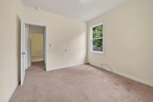 a view of an empty room with window