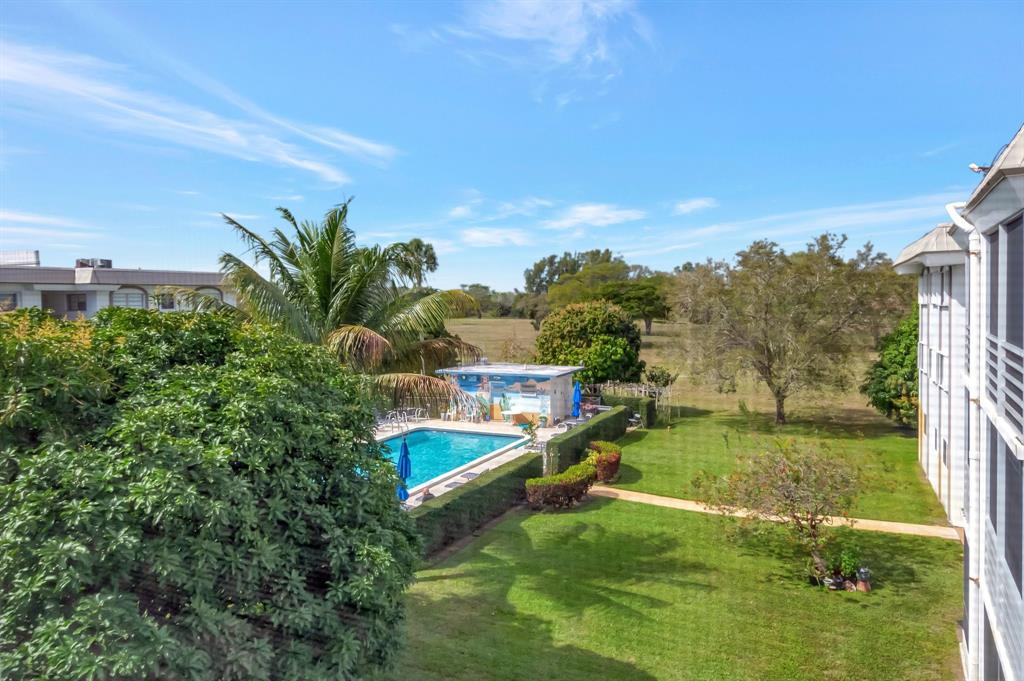 5501 Northwest 2nd Avenue, Unit 302 Boca Raton, FL 33487 - Photo 23 of 26 a view of a backyard