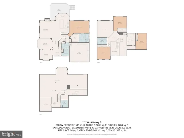 a view of a kitchen with large windows