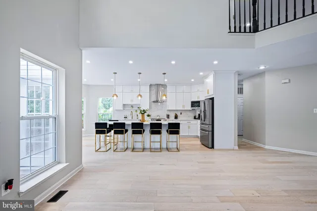 a bedroom with bed and a window