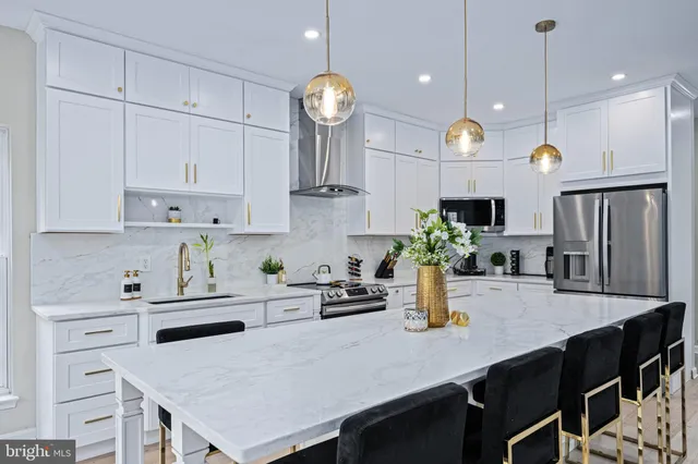 a view of a pathway with a fountain in the balcony