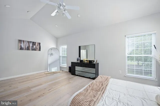 a big yard with lots of green space and trees