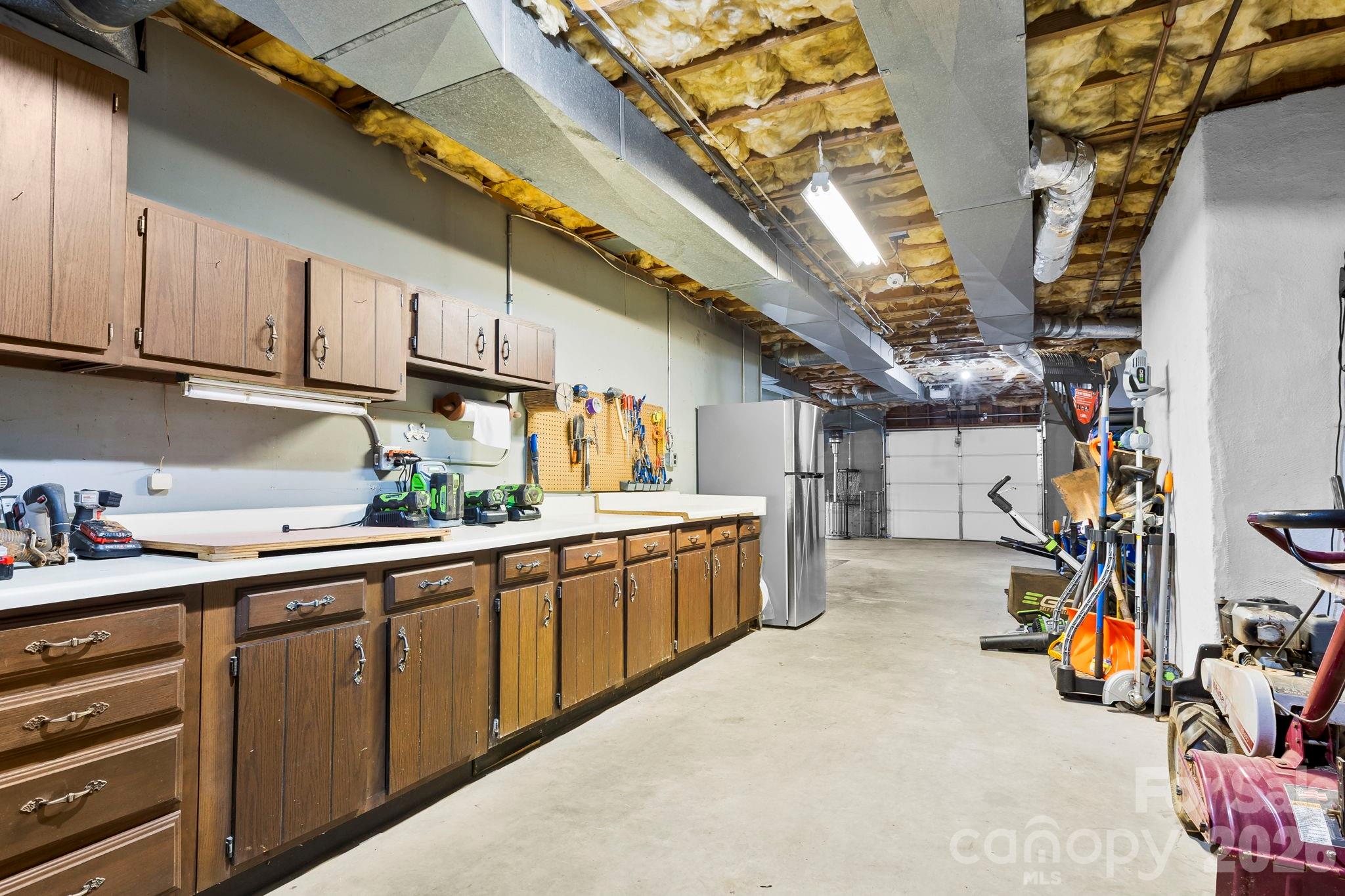 15 Blueberry Hill Road Asheville, NC 28804 - Photo 27 of 35 a kitchen with lots of appliances and cabinets