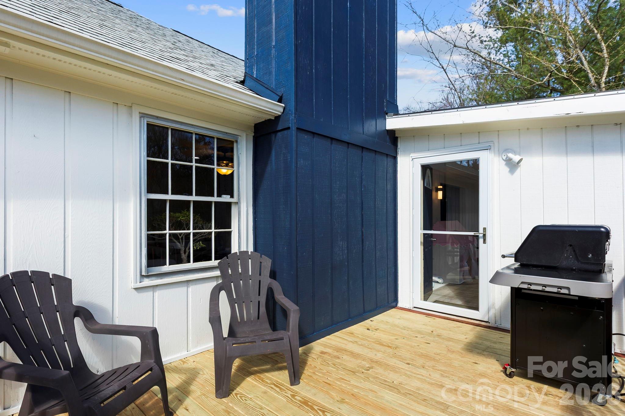 15 Blueberry Hill Road Asheville, NC 28804 - Photo 28 of 35 a view of a livingroom with furniture and front door
