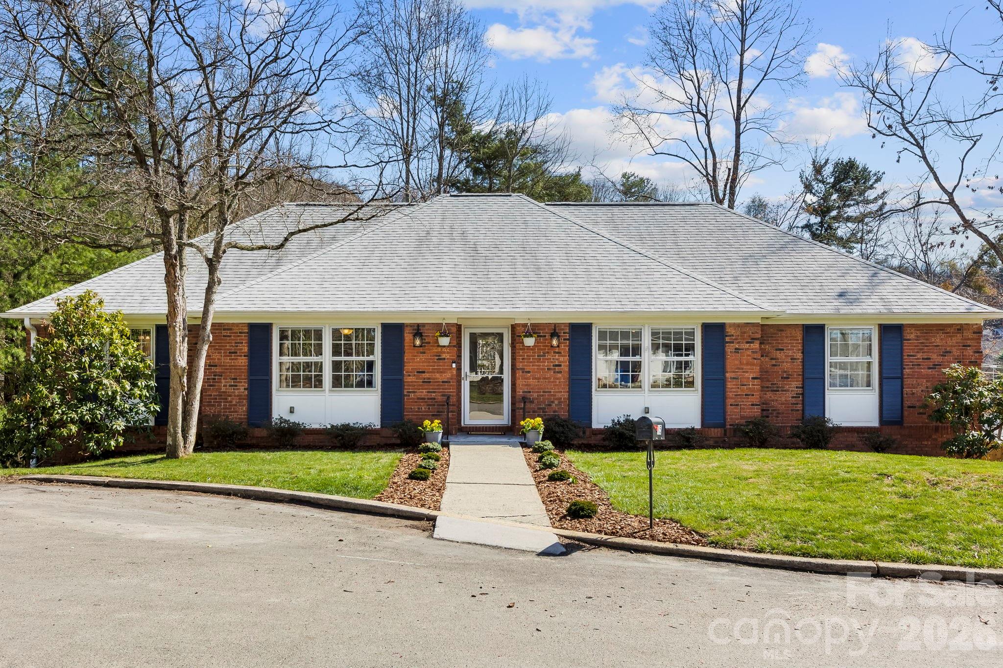 15 Blueberry Hill Road Asheville, NC 28804 - Photo 35 of 35 a view of a house with a yard and large tree