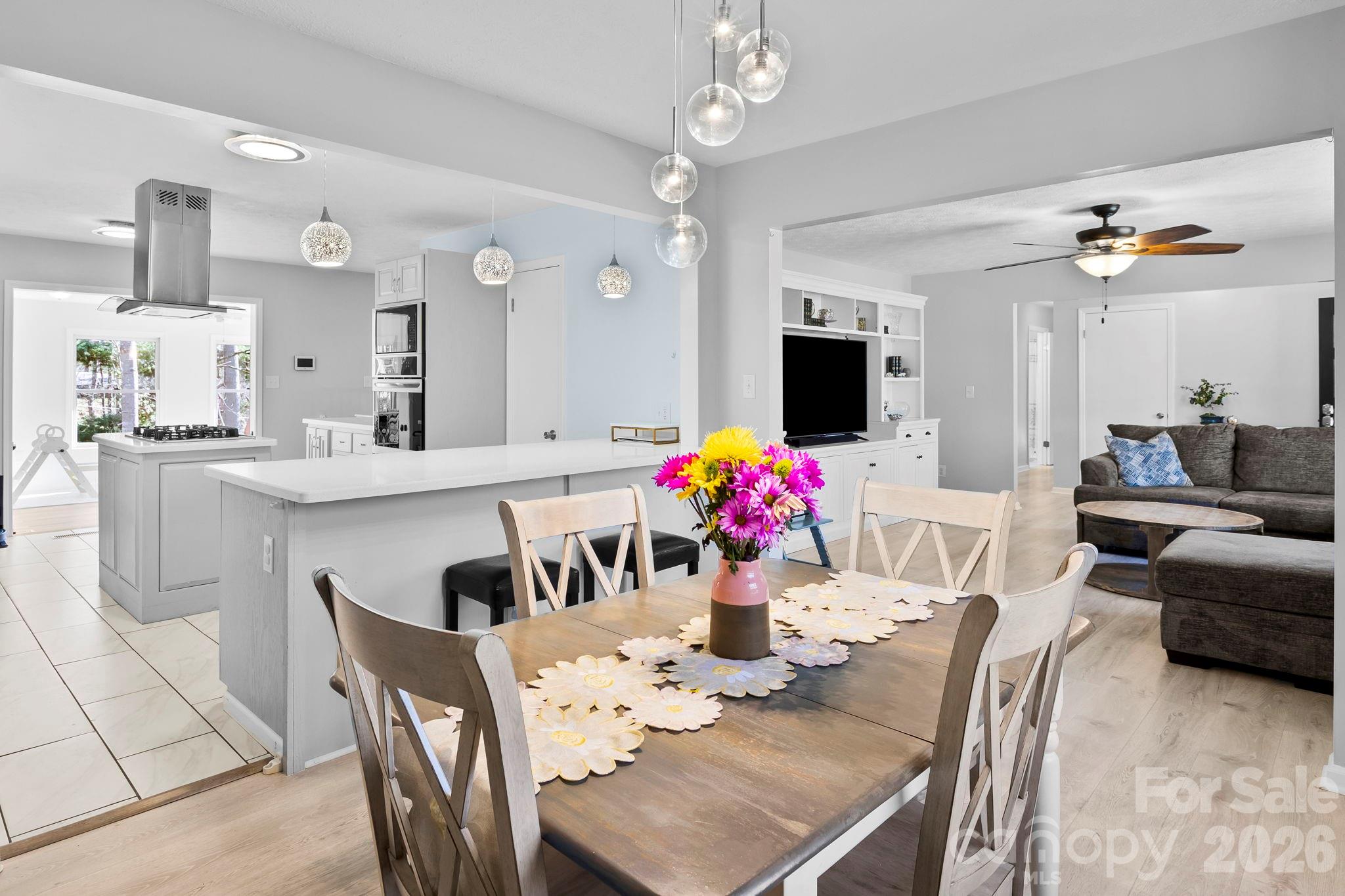 15 Blueberry Hill Road Asheville, NC 28804 - Photo 6 of 35 a view of a dining room with furniture and a chandelier