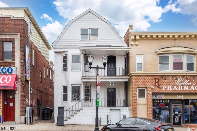 662 Mt Prospect Avenue Newark, NJ 07104 - Photo 15 of 15 a view of a building with retail shops