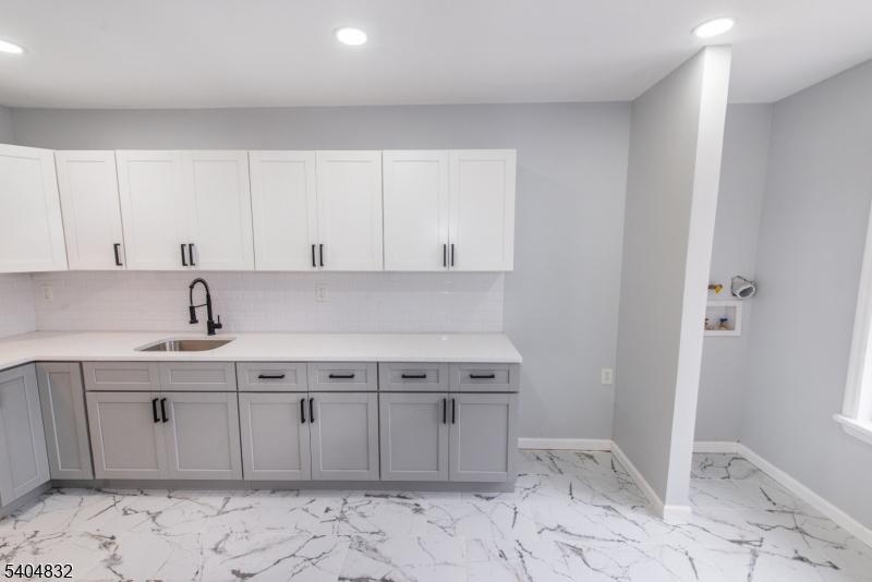 662 Mt Prospect Avenue Newark, NJ 07104 - Photo 9 of 15 a view of a kitchen with a sink