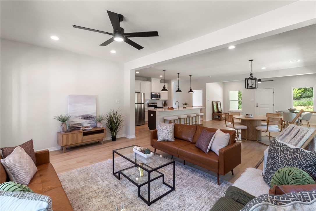 1104 Berkeley Street College Station, TX 77840 - Photo 12 of 44 a living room with furniture and a large window