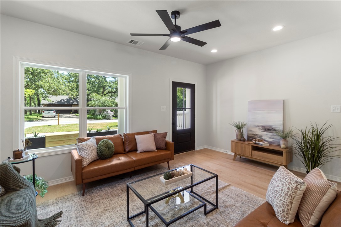 1104 Berkeley Street College Station, TX 77840 - Photo 15 of 44 a living room with furniture and a large window