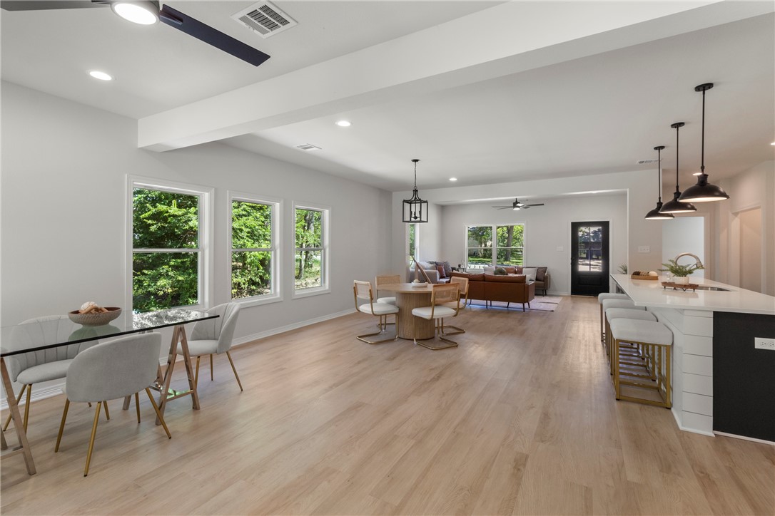 1104 Berkeley Street College Station, TX 77840 - Photo 19 of 44 a living room with furniture and a large window