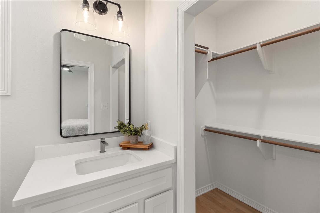 1104 Berkeley Street College Station, TX 77840 - Photo 31 of 44 a bathroom with a sink and a mirror