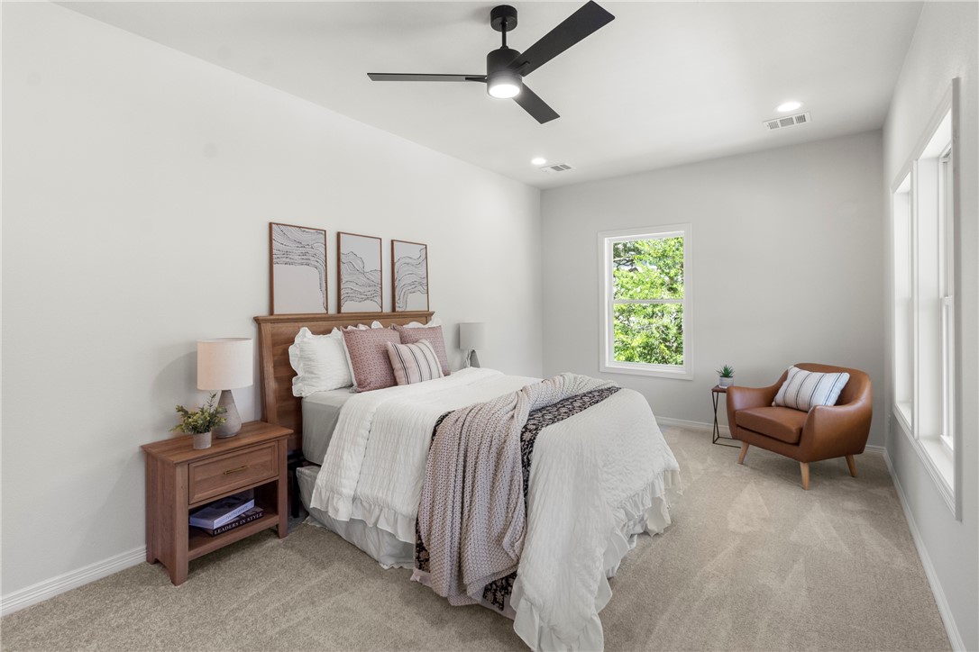 1104 Berkeley Street College Station, TX 77840 - Photo 35 of 44 a bed room with a bed and a window