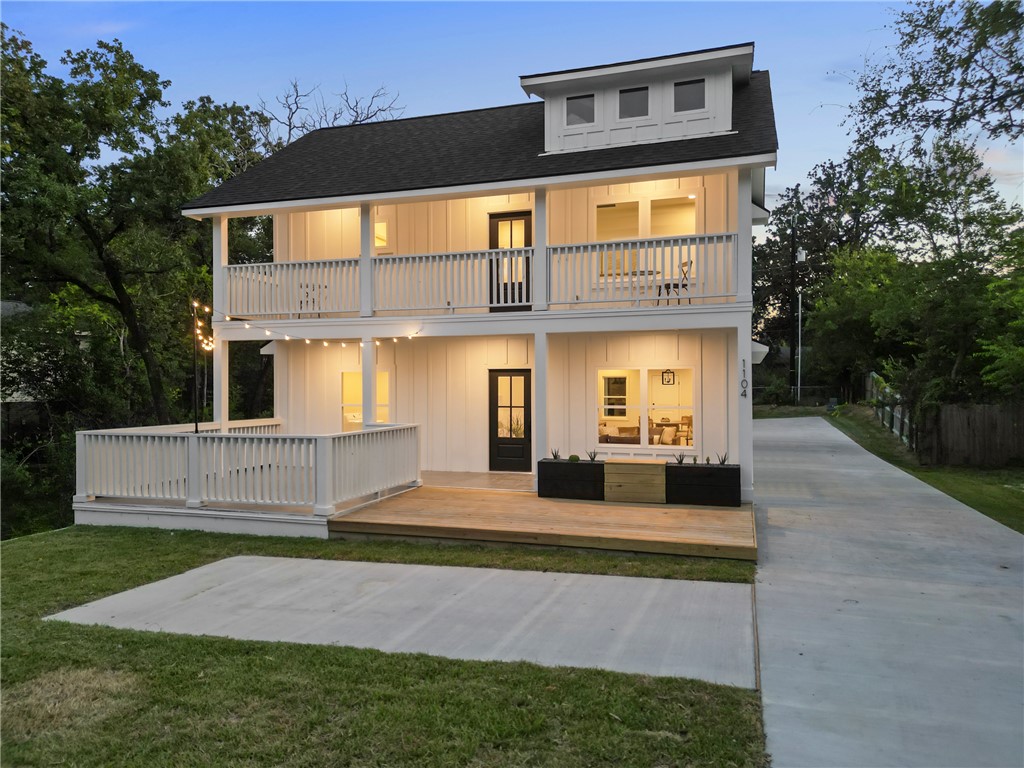 1104 Berkeley Street College Station, TX 77840 - Photo 4 of 44 a front view of a house with a yard