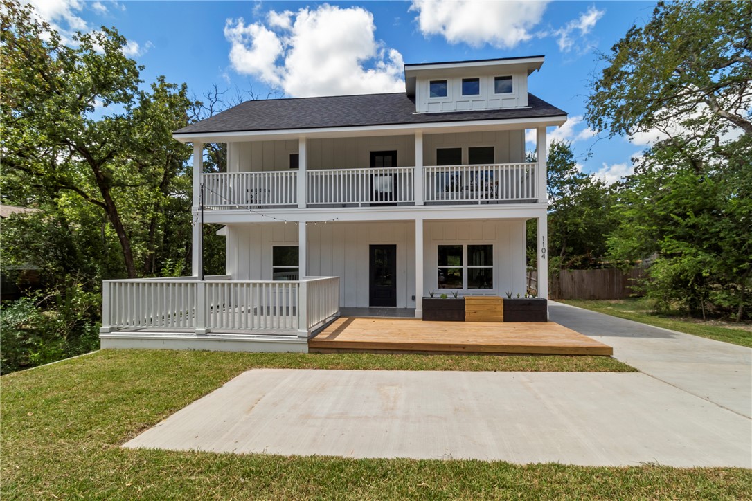 1104 Berkeley Street College Station, TX 77840 - Photo 5 of 44 a front view of a house with a yard