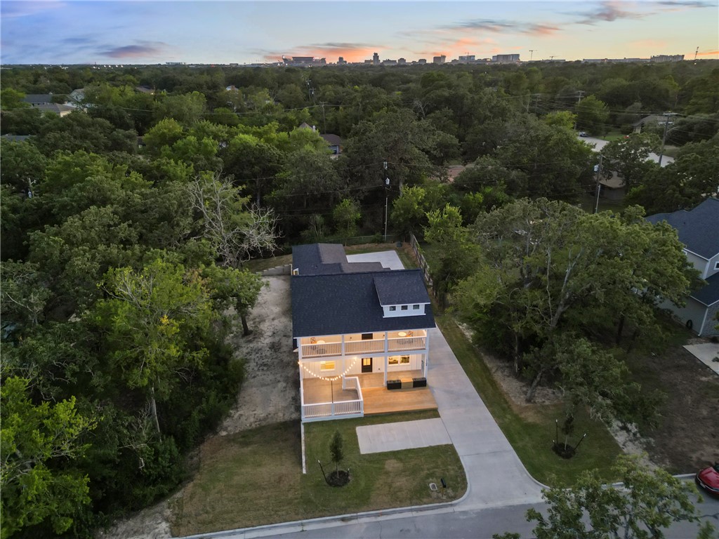 1104 Berkeley Street College Station, TX 77840 - Photo 7 of 44 an aerial view of a house with a yard