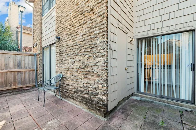 a view of a porch with a bench