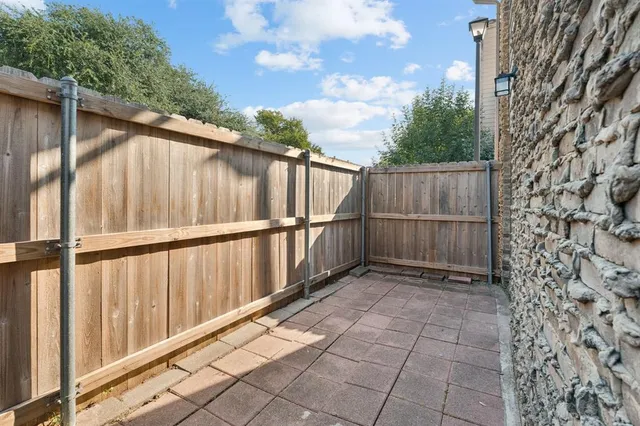 a view of a wooden fence