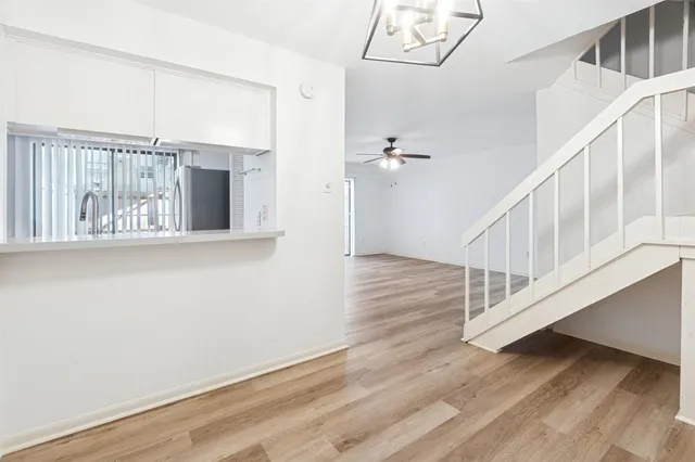 a view of entryway with wooden floor