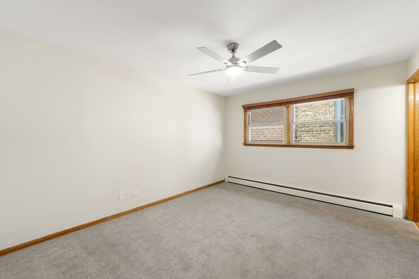 5400 West Dakin Street, Unit 1 Chicago, IL 60641 - Photo 13 of 20 a view of an empty room with a window