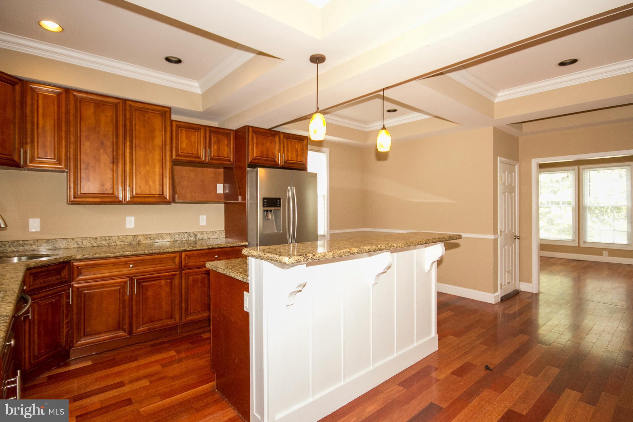 642 Orpington Road Baltimore, MD 21229 - Photo 6 of 20 Center Island w/Cooktop