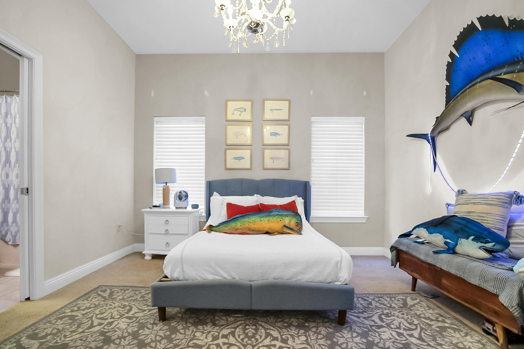 4372 Stonebridge Road Destin, FL 32541 - Photo 39 of 83 a bedroom with a bed and a chandelier