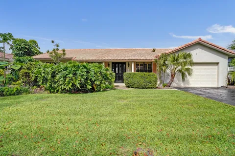 front view of a house with a big yard