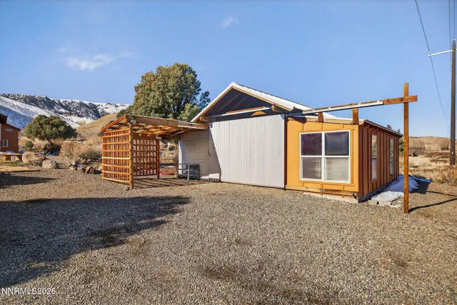 a view of a garage with wooden floor